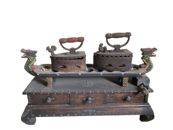 The First Steam Iron Used by a New York Cleaning Company in 1926